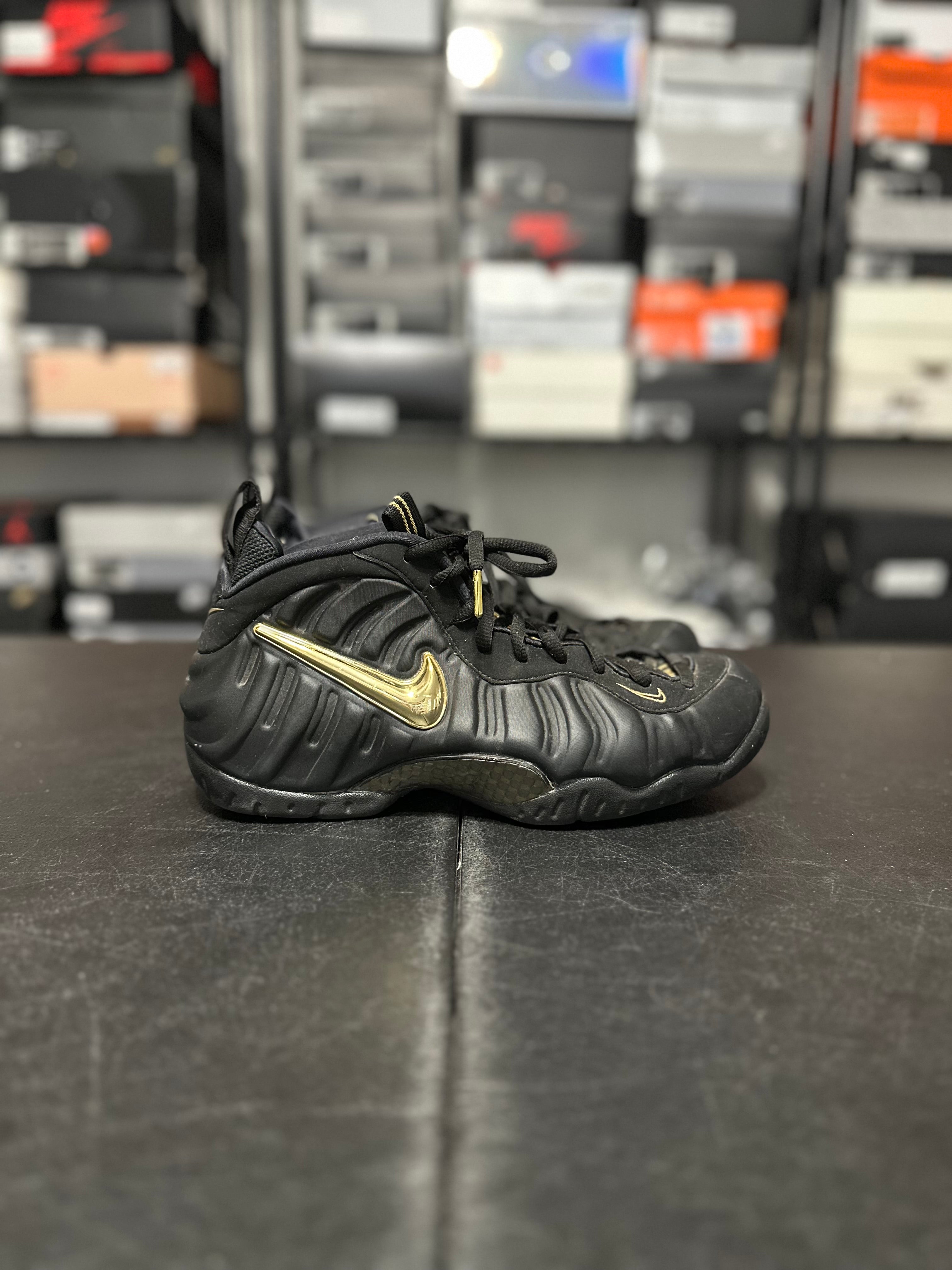 Size 9 - Foamposite black metallic gold