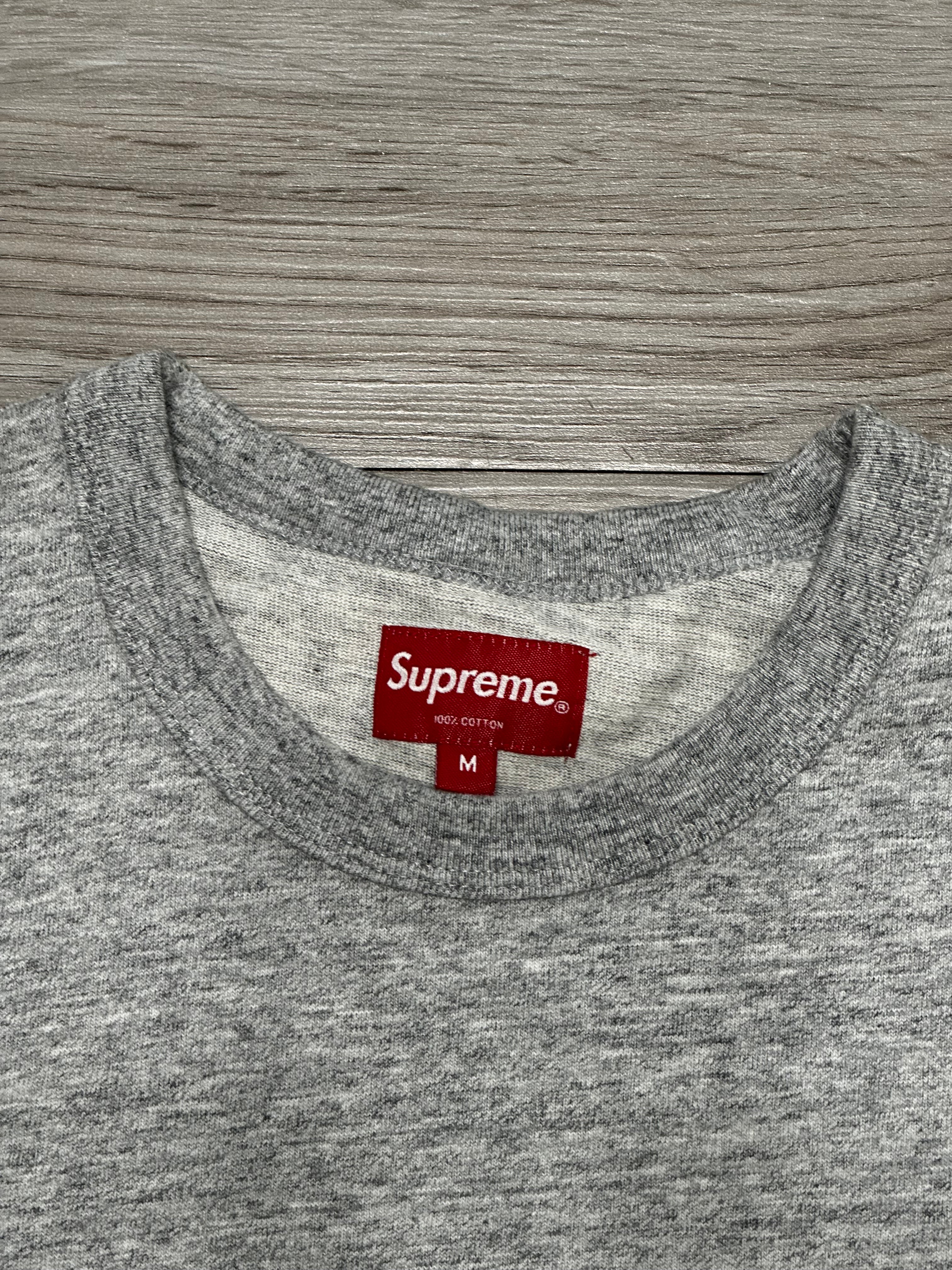 Size M - supreme tee