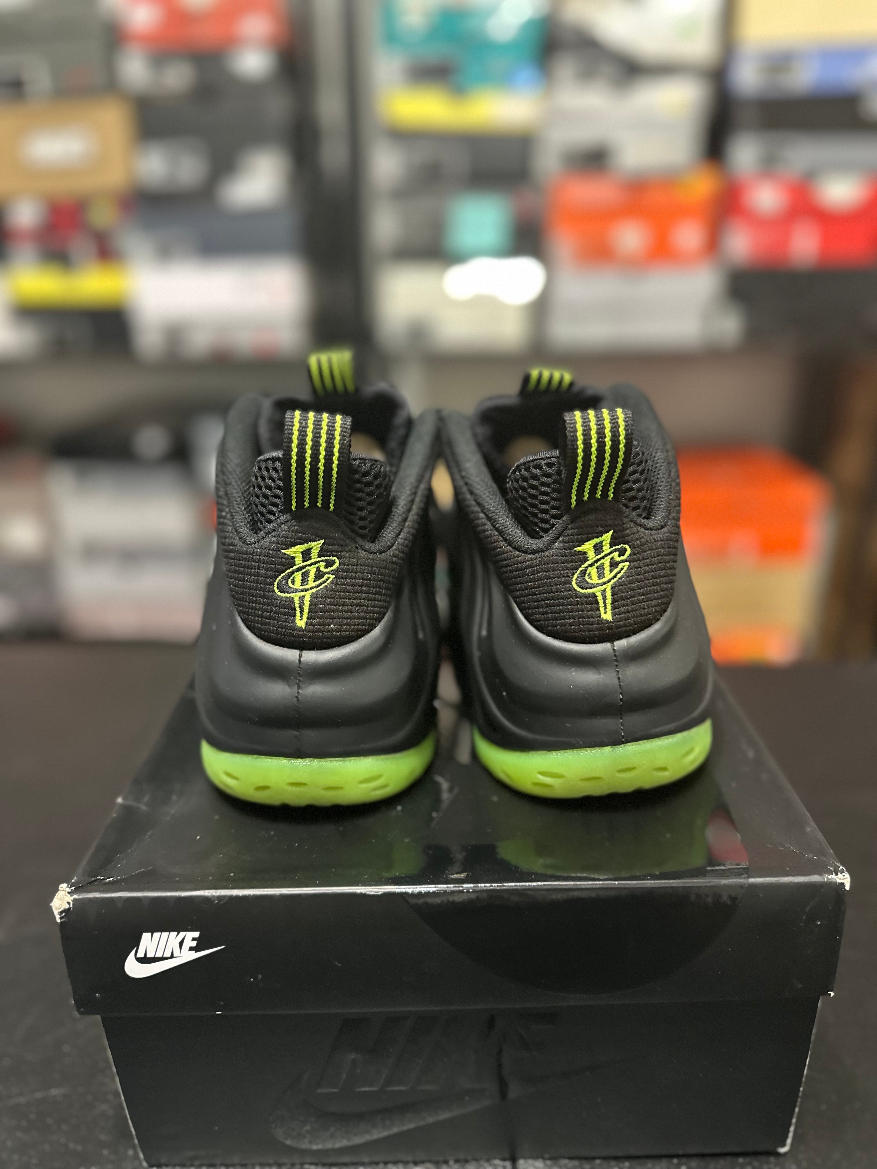 Size 11 - Air foamposite one black volt