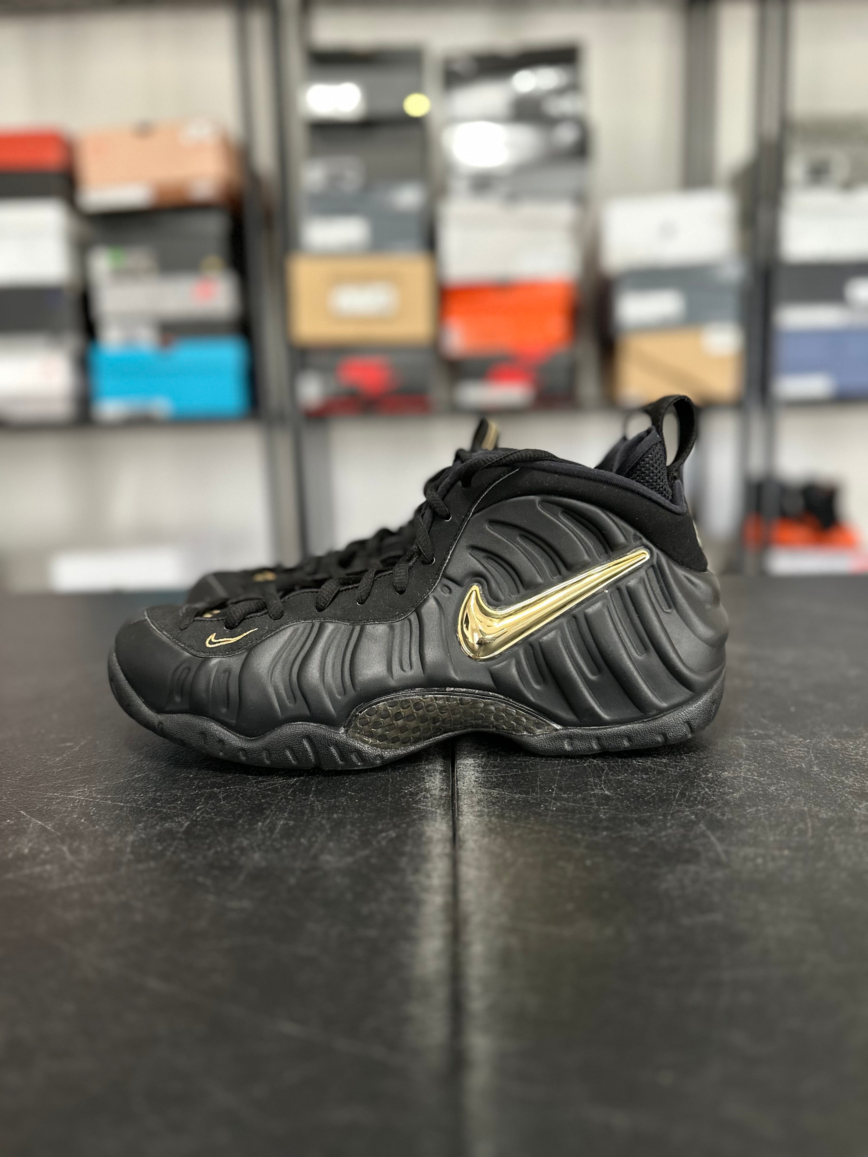 Size 10.5 - Foamposite black metallic gold