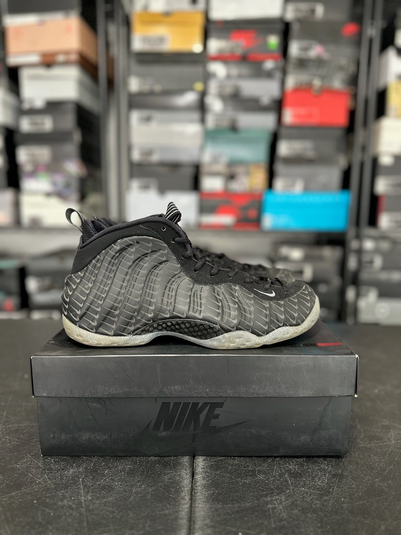 Size 10.5 - Foamposite 1 All Over Swoosh Black