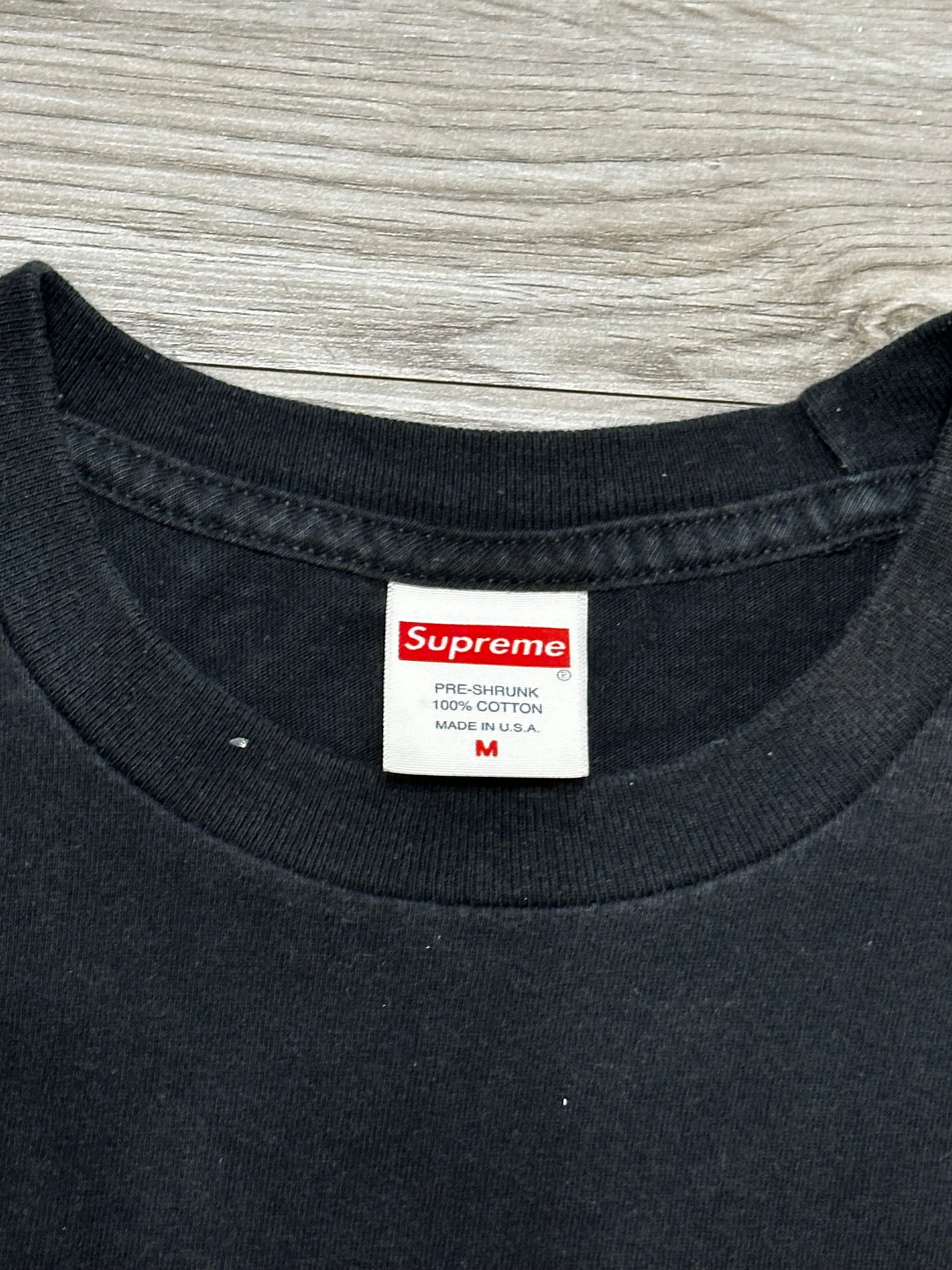 Size M - supreme tee