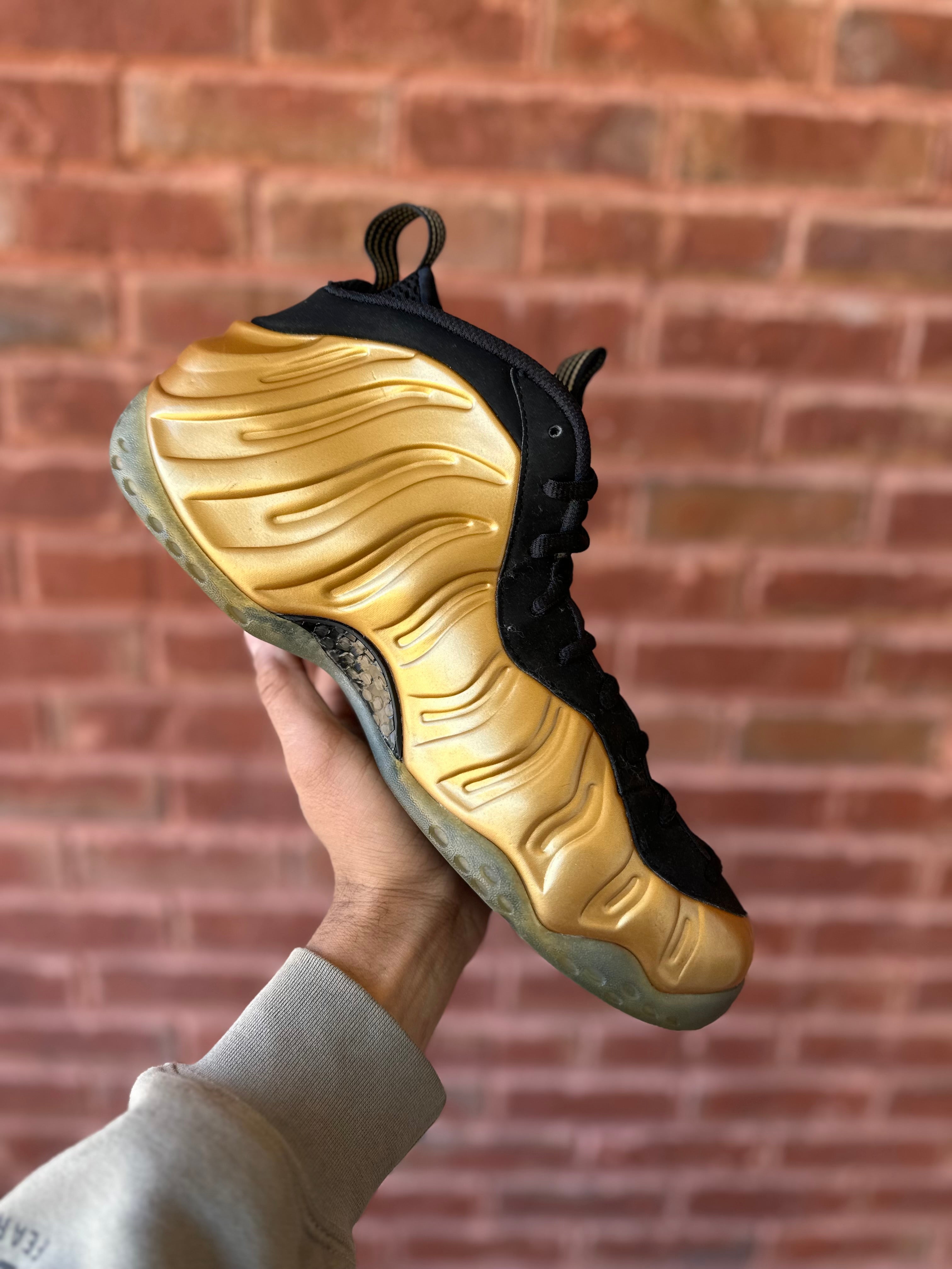 Size 12 -air foamposite one gold