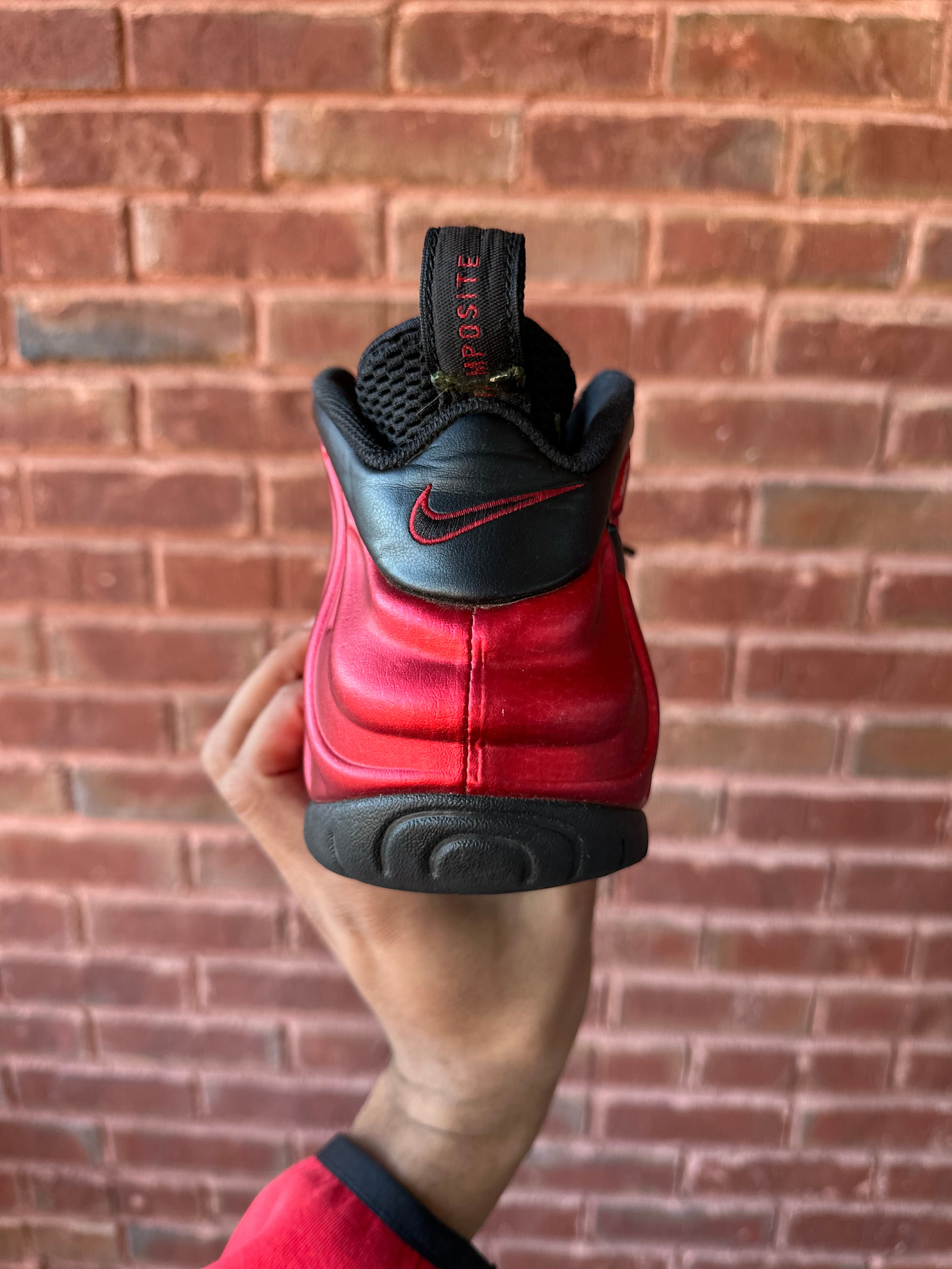 Size 8.5 - air foamposite pro university red