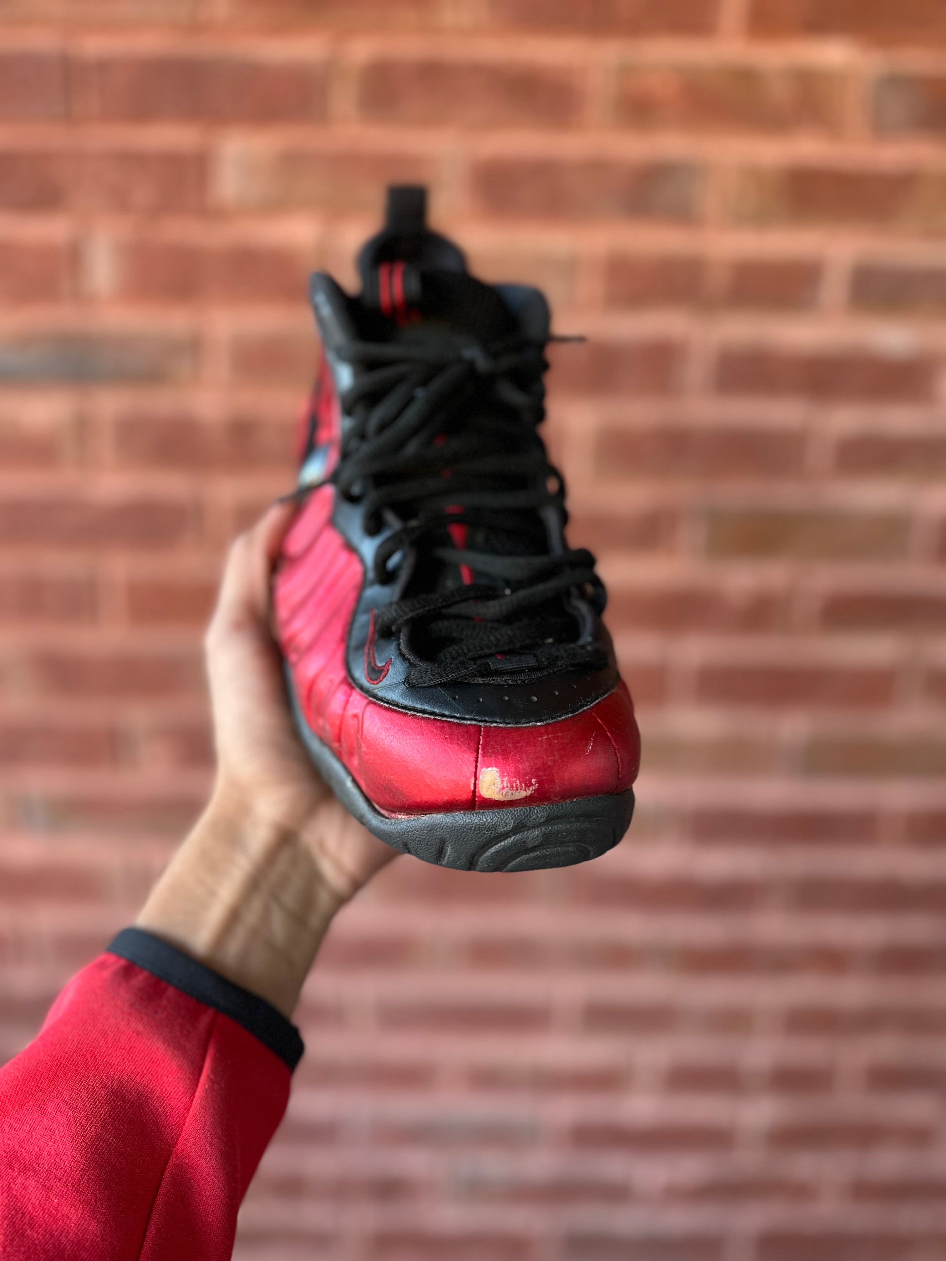 Size 8.5 - air foamposite pro university red