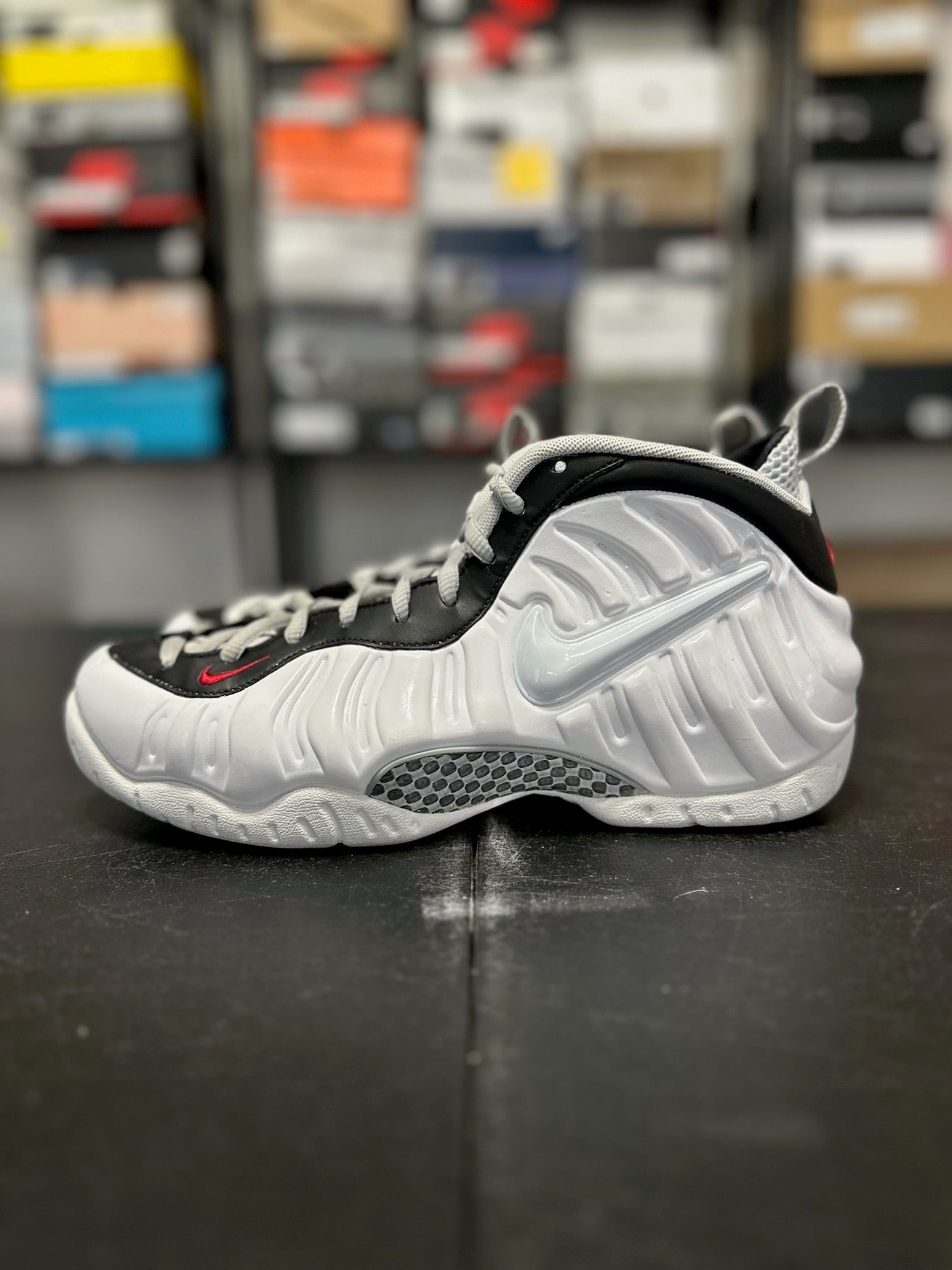 Size 9.5 - Foamposite Pro White Black University Red