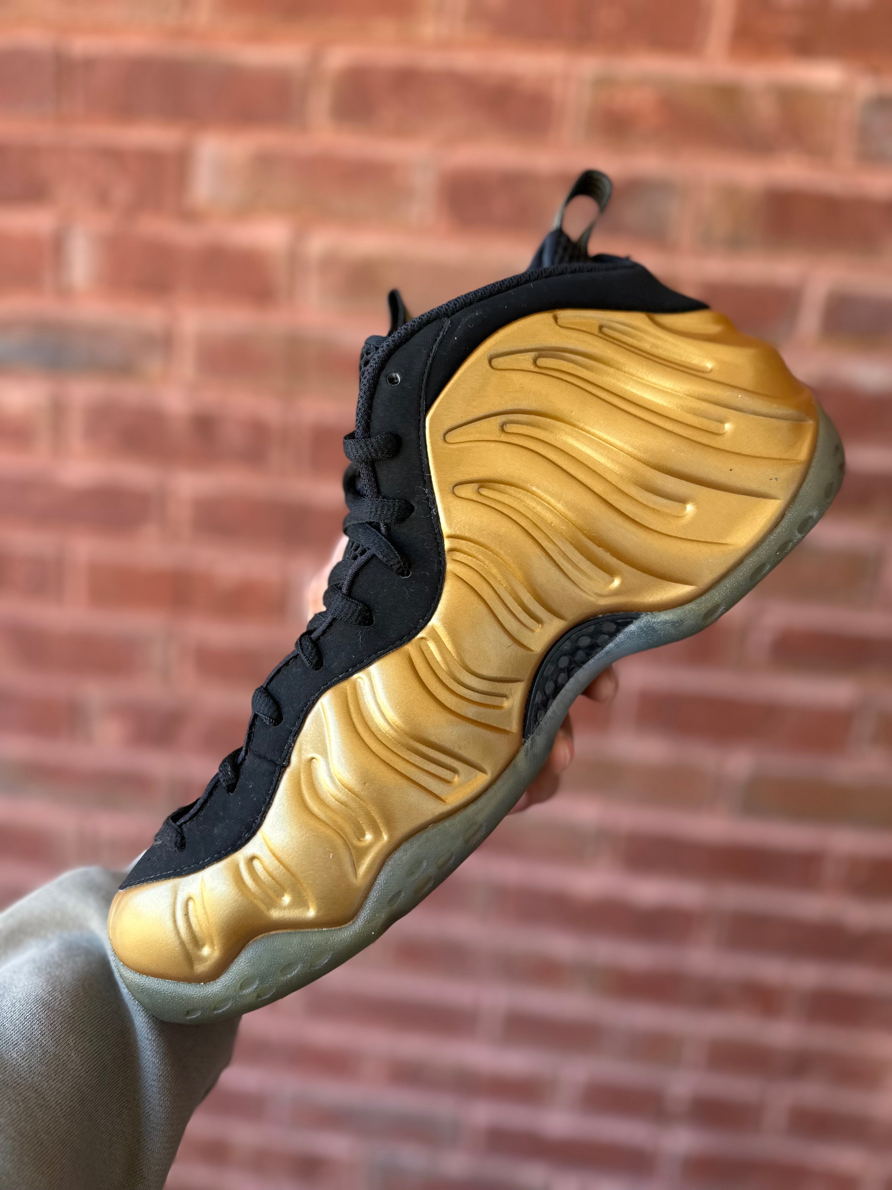 Size 12 -air foamposite one gold