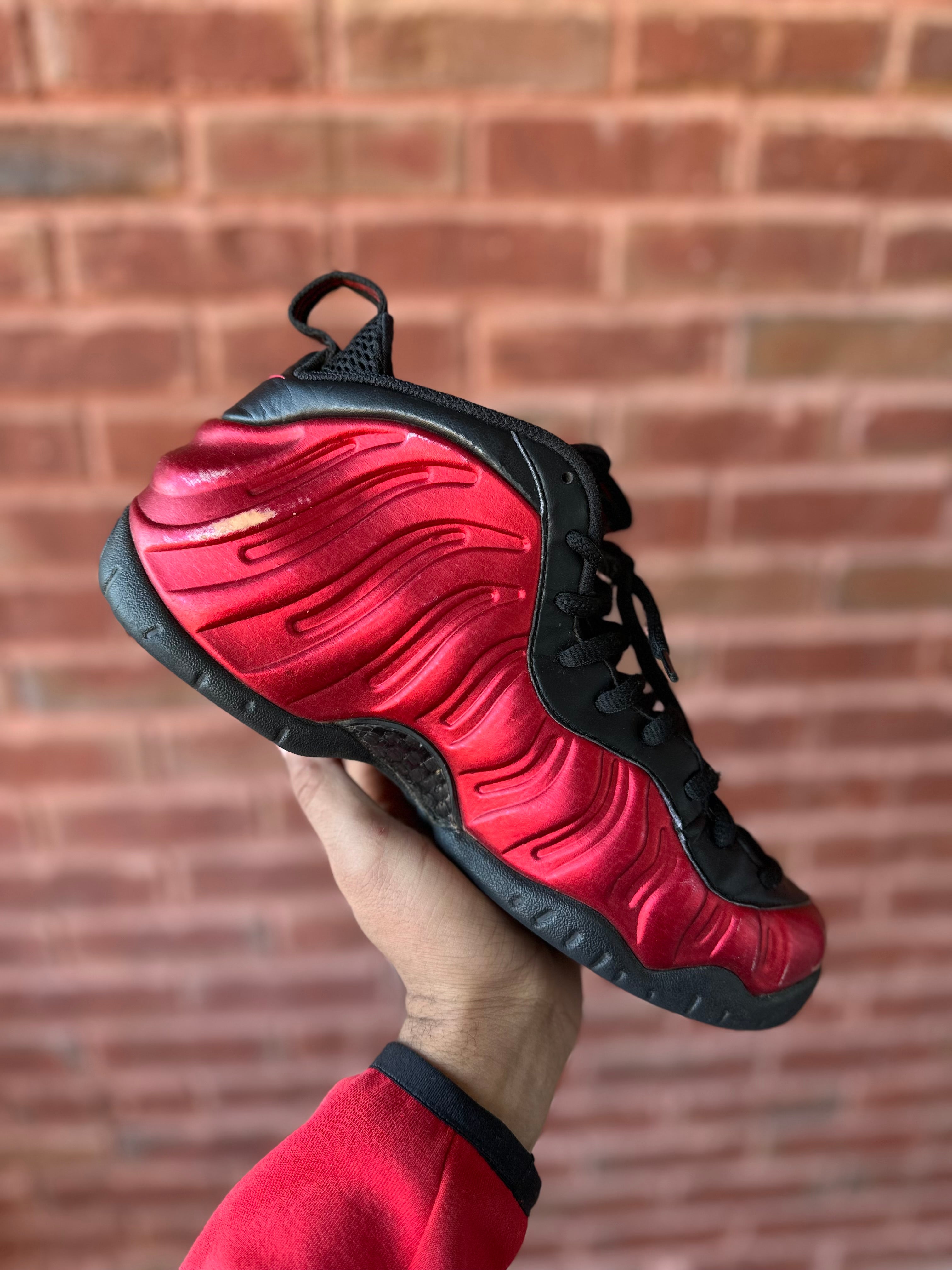 Size 8.5 - air foamposite pro university red