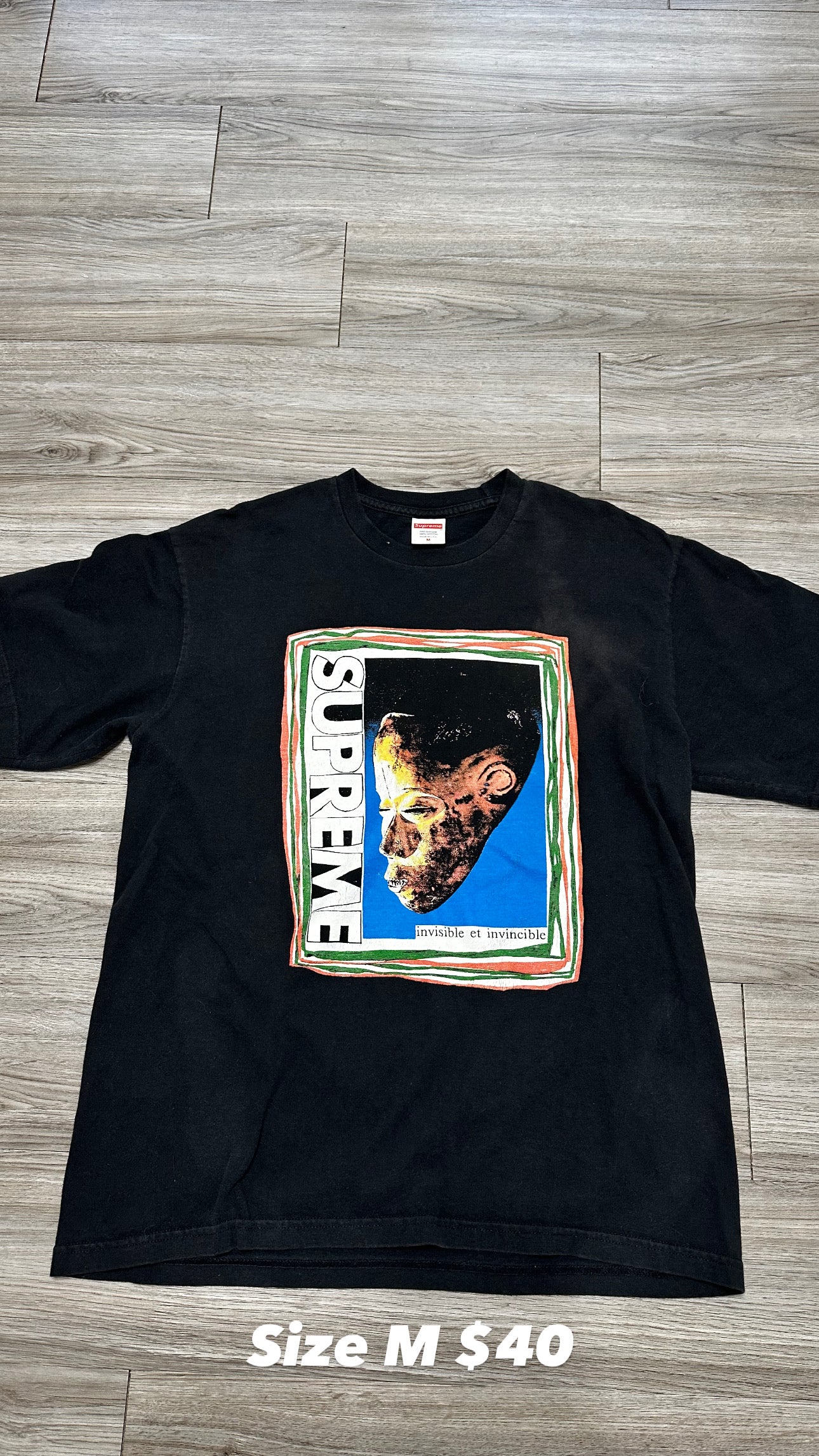 Size M - supreme tee