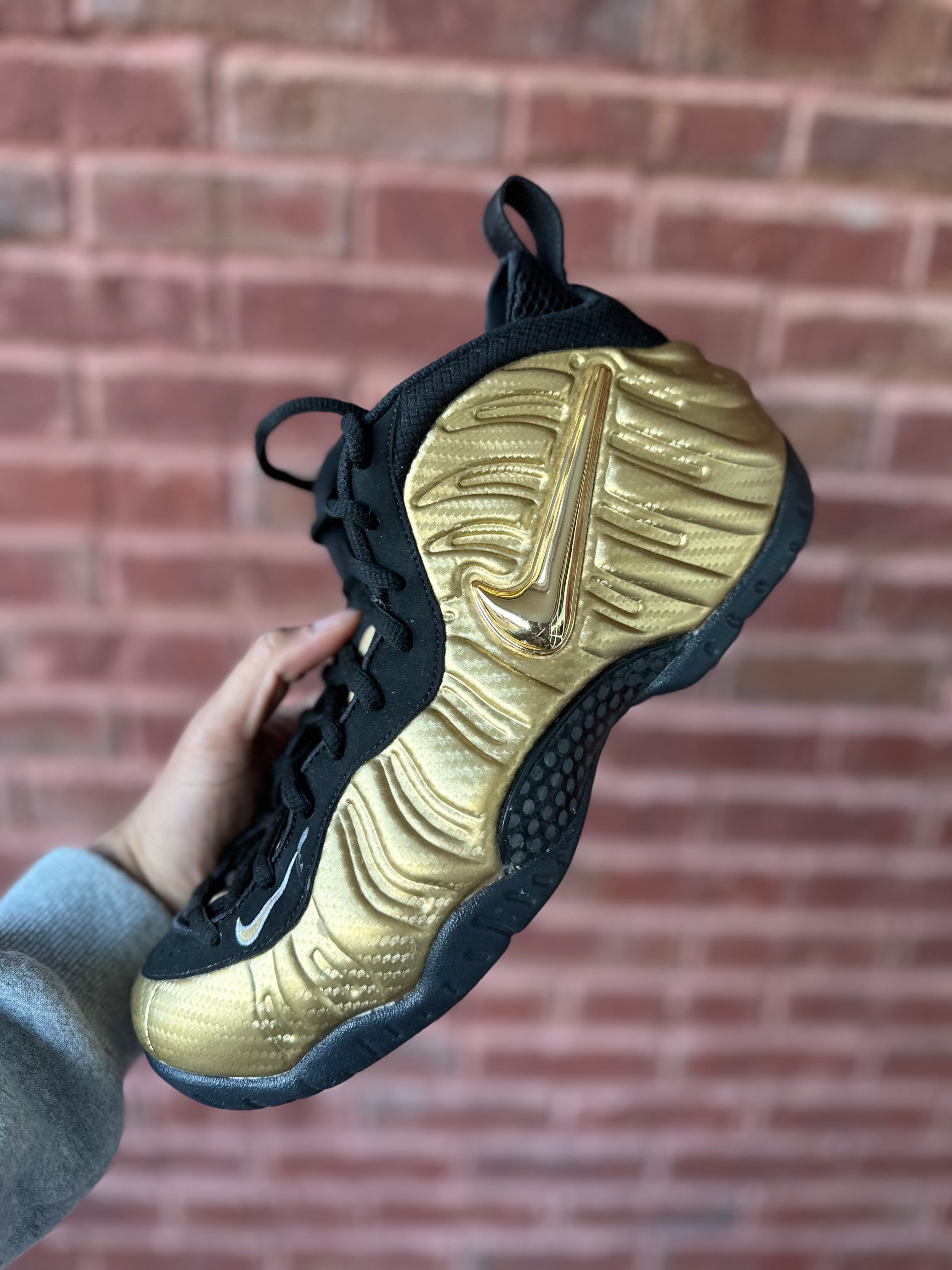 Size 10 - air foamposite pro metallic gold