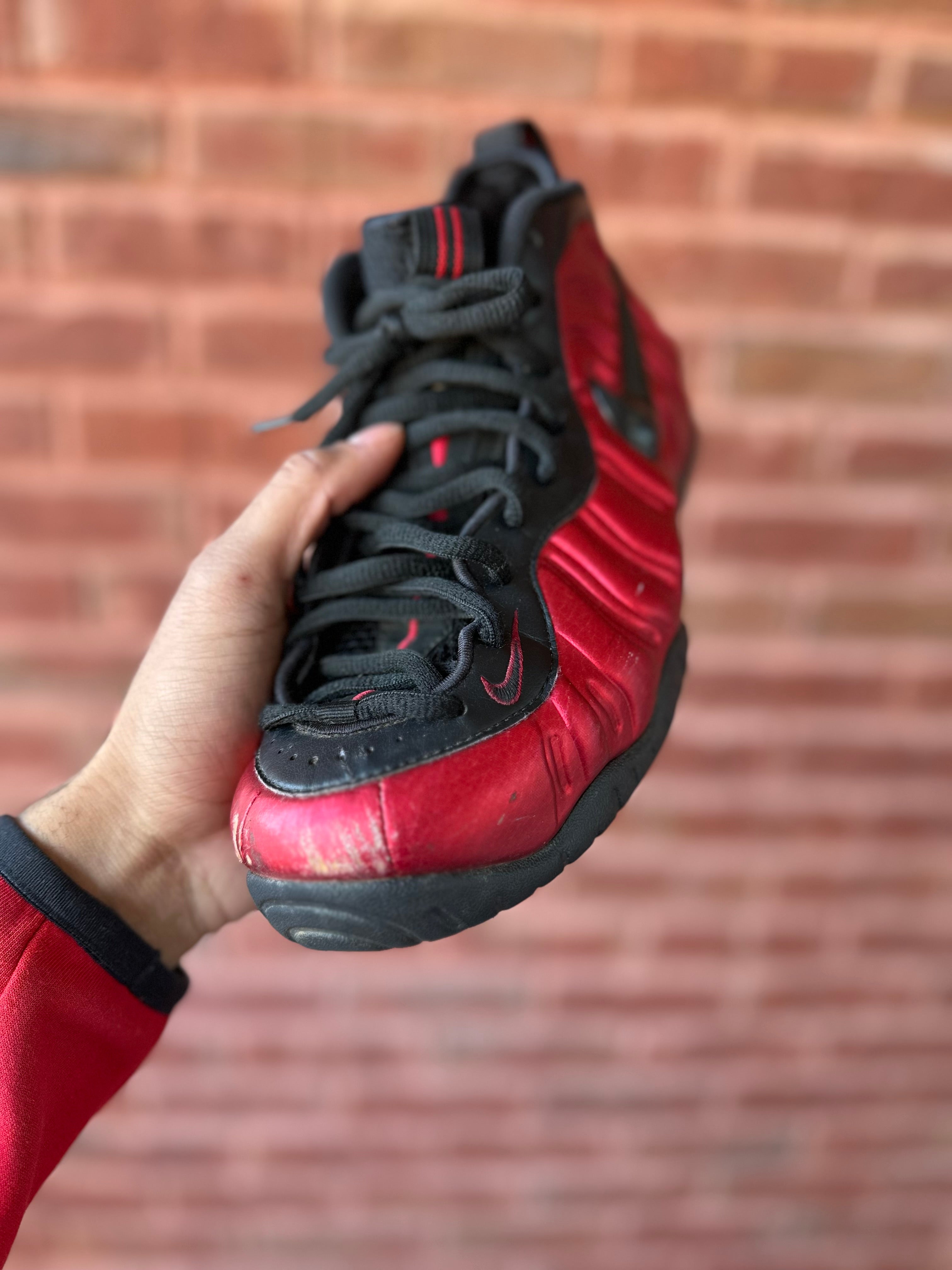 Size 8.5 - air foamposite pro university red