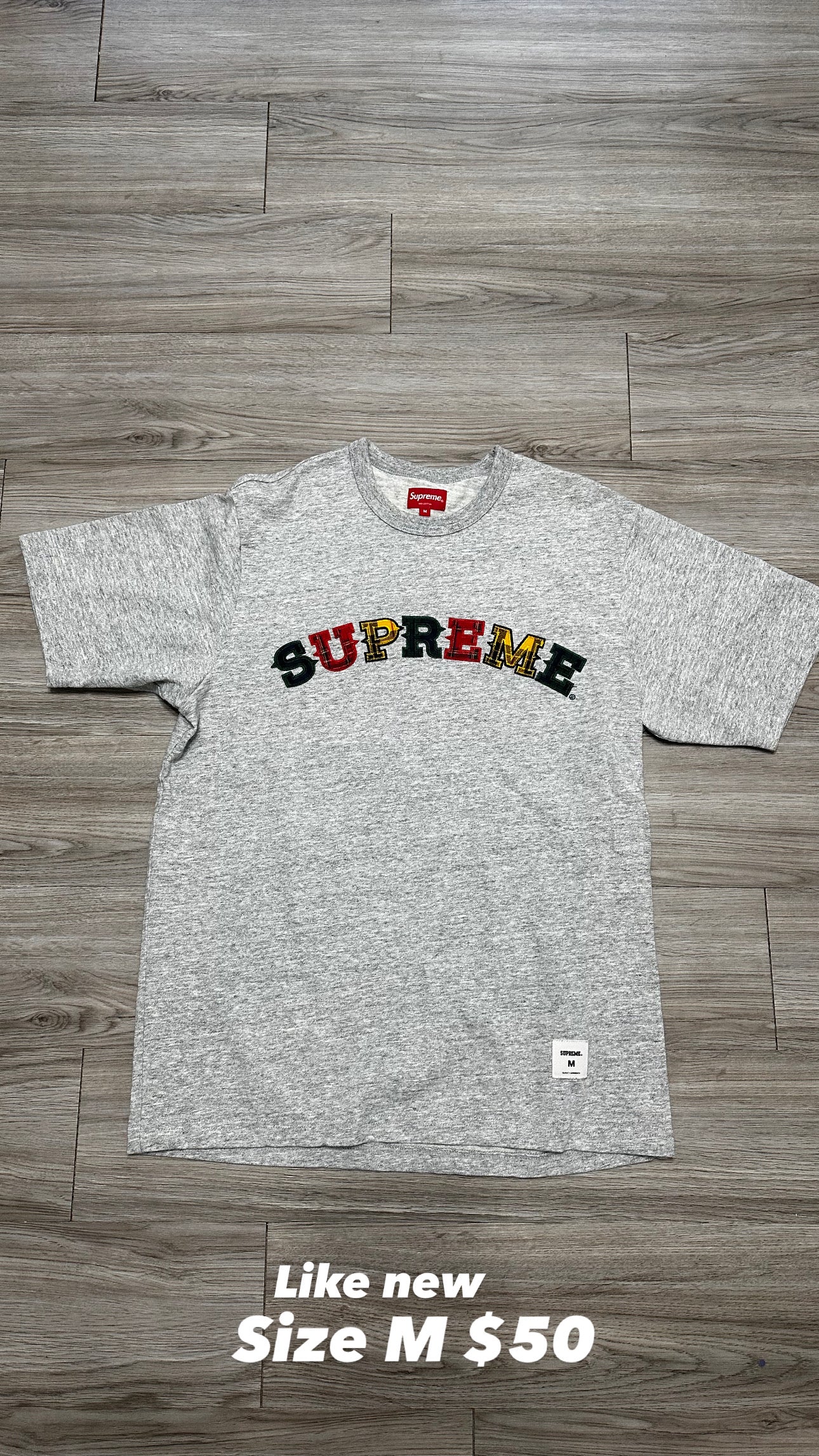 Size M - supreme tee