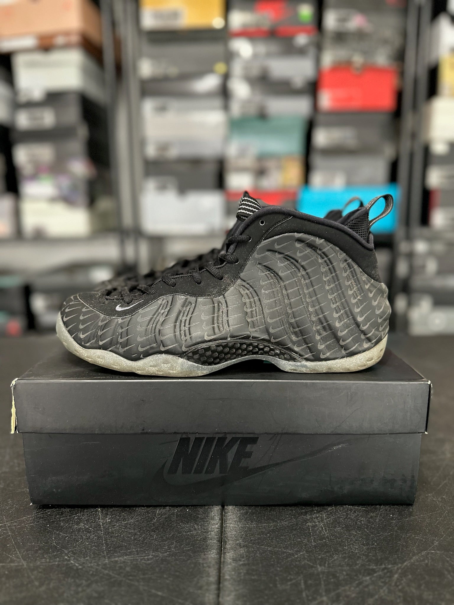 Size 10.5 - Foamposite 1 All Over Swoosh Black